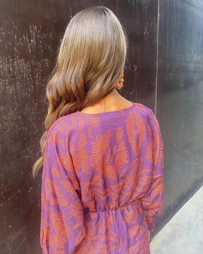 Isla Bella | Vestido largo cruzado con estampado elegante